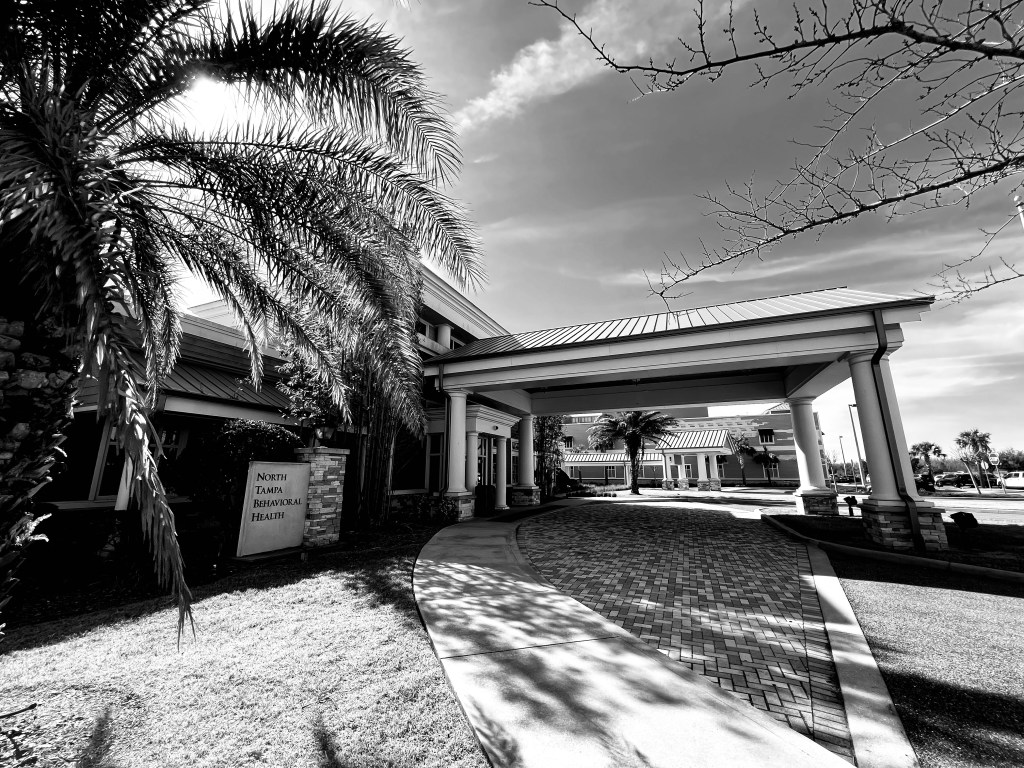 This is a photo of North Tampa Behavioral Health. Sarasota Memorial Hospital-Venice routinelty dumps patients here at North Tampa Behavioral Health, which is part of a chain of treatment centers the Justice Department fined $20 million. Among the charges: 1) Admitting patients who didn't belong there; 2) Providing substandard care; 3) Keeping patient longer than necessary to bilk insurance companies.